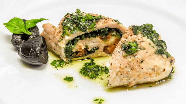 Turkey is topped with spinach in a protein diet